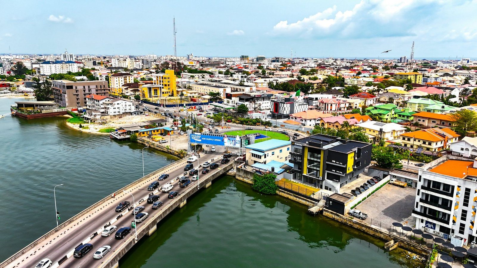 Lagos from the air: a bridge crossing the lagoon into a modern district